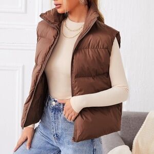 Mountain Equipment Coop women’s brown down vest size M